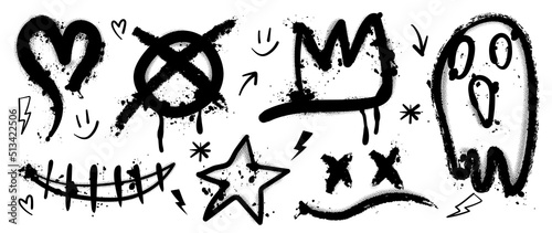 Set of black graffiti spray. Collection of arrow, skull, heart and symbols with spray texture and stencil pattern. Elements on white background for banner, decoration, street art and ads.