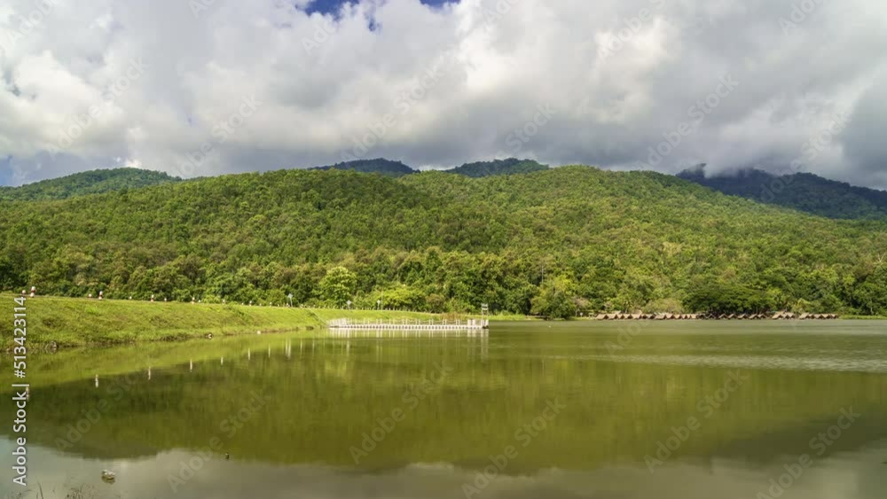 Time lapase of dense clouds moving above mountain ranges at Huay Tung Tao lake in Chiang Mai, Thailand Time lapase of dense clouds moving above mountain ranges at Huay Tung Tao lake in Chiang Mai, Thailand