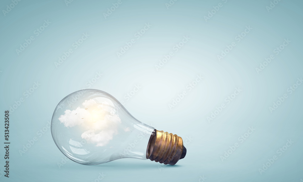 Light bulb on light blue background Light bulb on light blue background