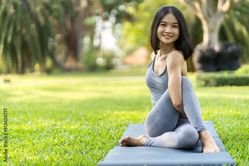 Portrait sport asian beauty body slim woman in sportswear sitting relax and girl practicing yoga and do fitness exercise in park at home.Diet concept.Fitness and healthy Portrait sport asian beauty body slim woman in sportswear sitting relax and girl practicing yoga and do fitness exercise in park at home.Diet concept.Fitness and healthy