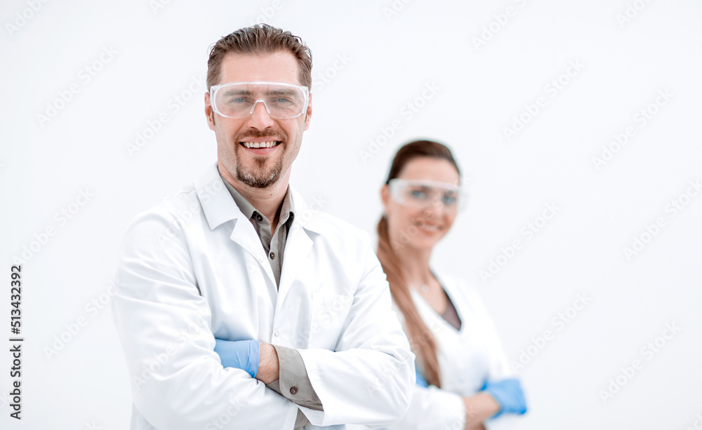 portrait of two successful researchers standing together portrait of two successful researchers standing together