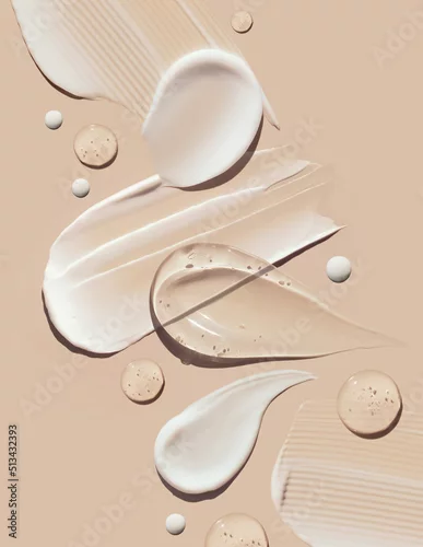 Obraz cosmetic smears of creamy texture on a pastel beige background	

