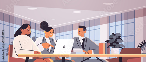 businesspeople using laptops business people team working together at round table in office teamwork concept