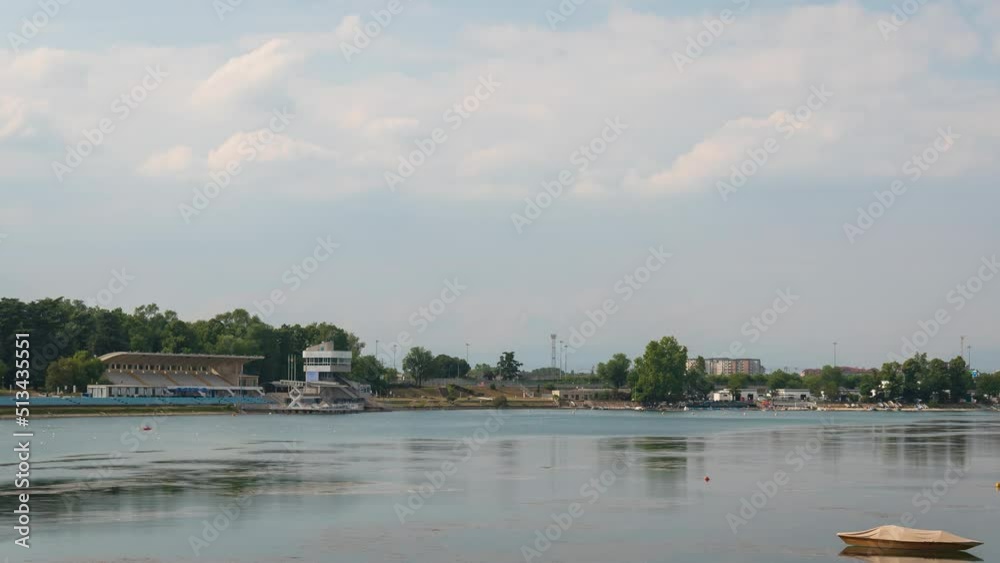 Time-lapse of Idroscalo lake park, canoes at the Idroscalo Park in Milan at overcast summer day Time-lapse of Idroscalo lake park, canoes at the Idroscalo Park in Milan at overcast summer day