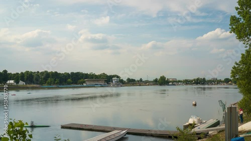 Time-lapse of Idroscalo lake park, canoes at the Idroscalo Park in Milan at overcast summer day photo