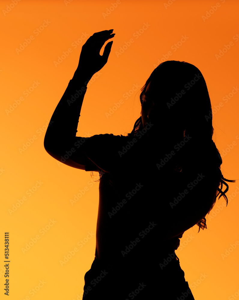 Expressive Woman Silhouette in Studio Shot