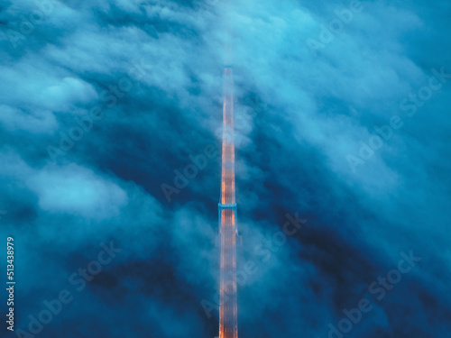 Cross-sea bridge in the fog at night