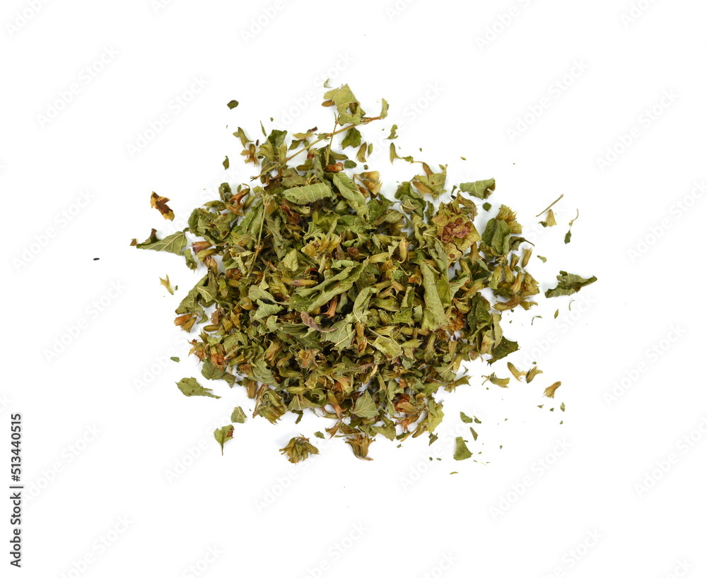 Lemon balm spice. Dried lemon balm pile isolated on white background. Bio organic lemon balm tea. Lemon balm spice. Dried lemon balm pile isolated on white background. Bio organic lemon balm tea.
