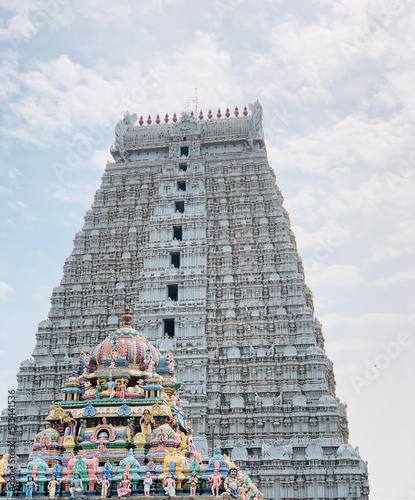 Hindu Shiva temple at Thiruvannamalai in Tamilnadu. Temple tower against blue sky background.