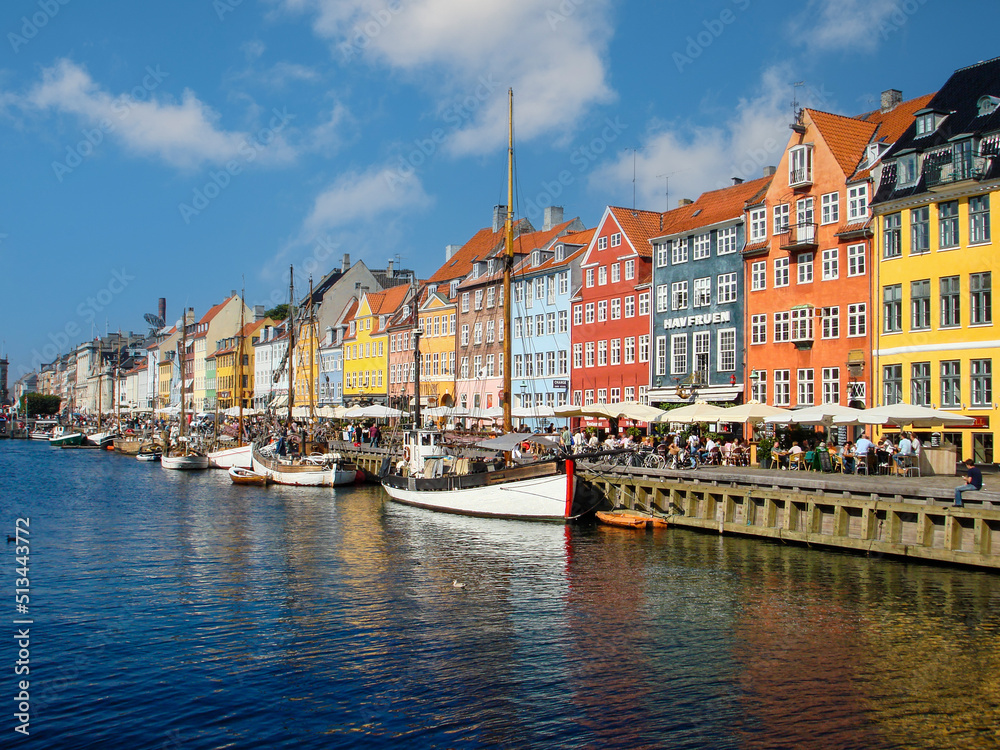 Nyhavn (New Harbor), a waterfront, canal and entertainment district, lined by brightly coloured 17th and early 18th century townhouses. 
