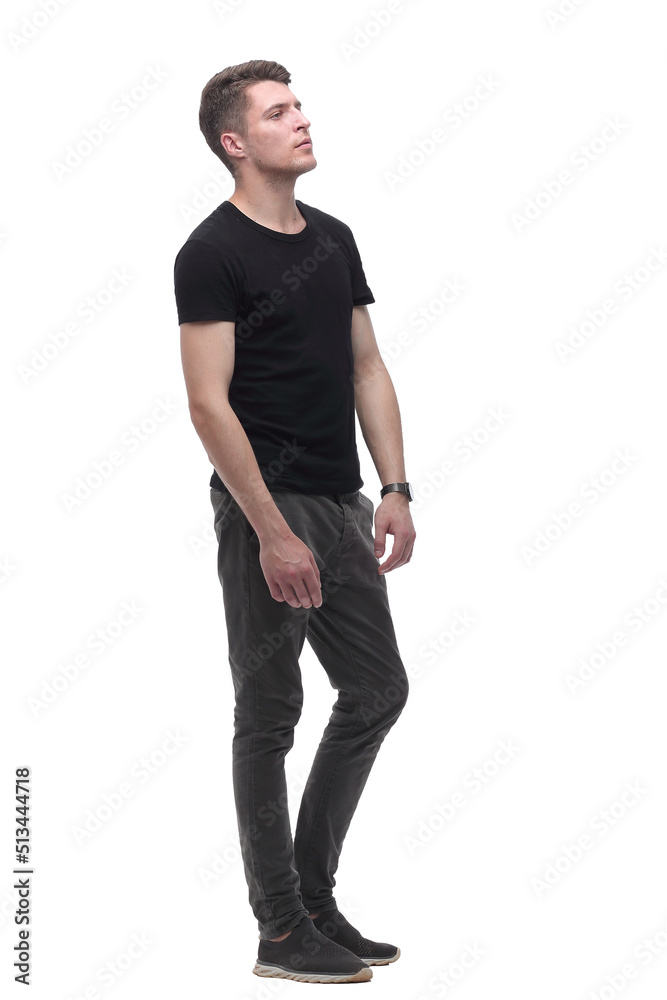 side view. the guy in the black t-shirt looking at the blank screen side view. the guy in the black t-shirt looking at the blank screen