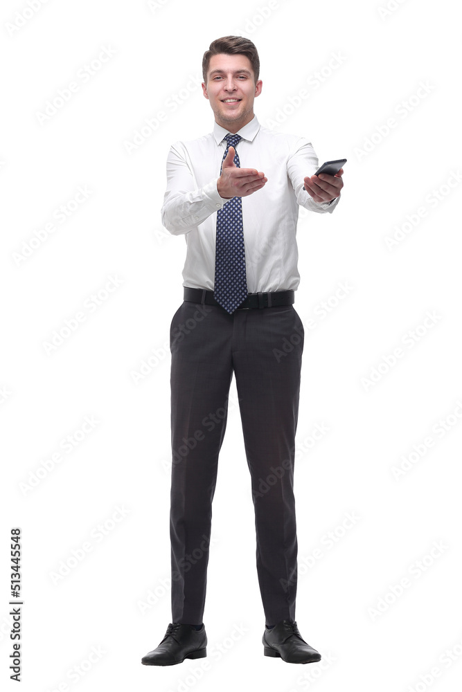 friendly young businessman with smartphone. isolated on white friendly young businessman with smartphone. isolated on white