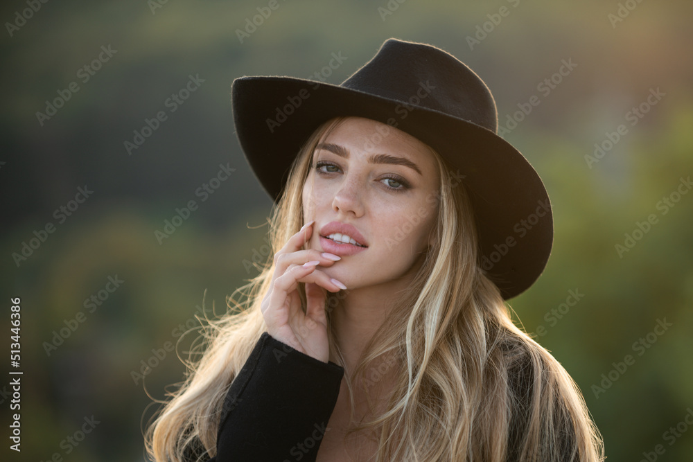 Beautiful young woman, tender girl in summer vogue hat. Fashion and beauty. Beautiful young woman, tender girl in summer vogue hat. Fashion and beauty.