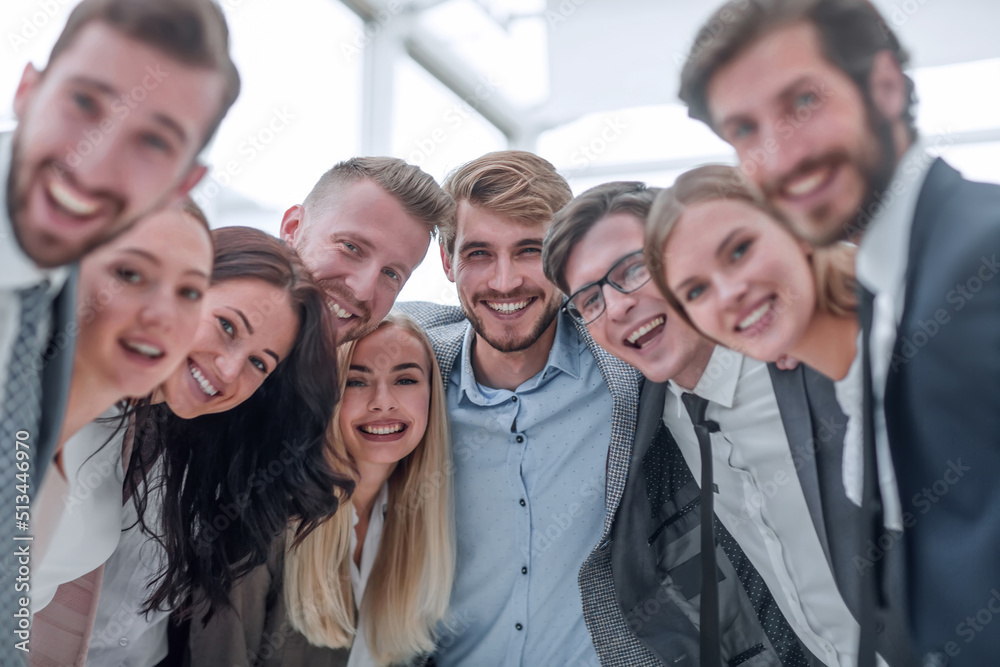 close up.a team of young business people looking at the camera. close up.a team of young business people looking at the camera.