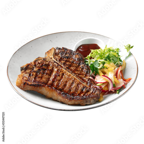 Isolated portion of grilled beef t-bone steak on white background photo