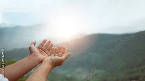 Christian man with open hands worship christian. Eucharist Therapy Bless God Helping Repent Catholic Easter Lent Mind Pray. Christian concept background. nature background..