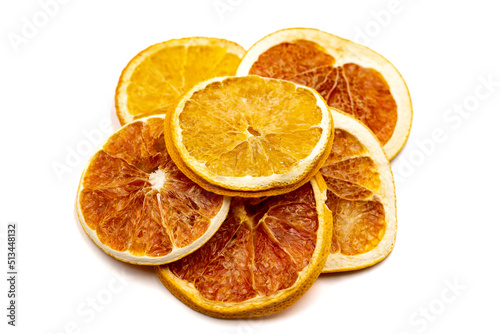 Dried orange slices. Sliced dried orange isolated on a white background. Sun-dried fruit. close up
