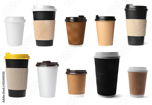 Set with paper coffee cups with lids on white background
