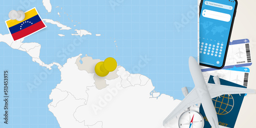 Travel to Venezuela concept, map with pin on map of Venezuela. Vacation preparation map, flag, passport and tickets.
