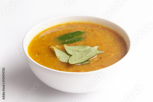 Close-up of Sambhar or Sambar is a popular south Indian food, made with lentils and many vegetables   photo