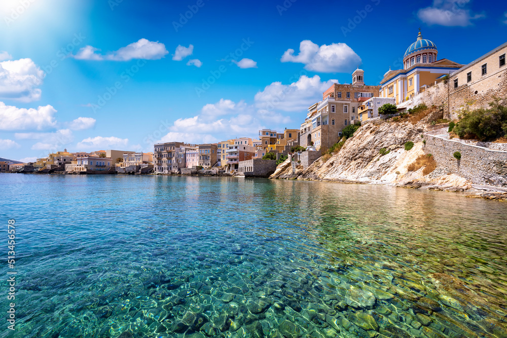 The emerald sea at the Vaporia district, city of Ermoupoli at Syros island, Cyclades, Greece, during a sunny summer day