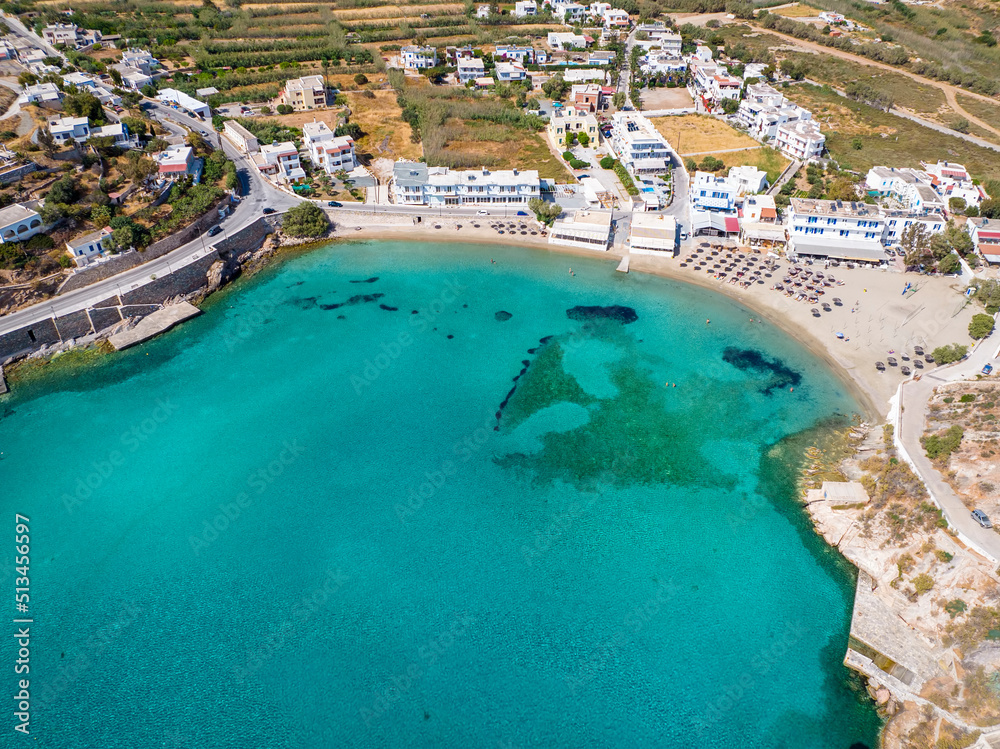Aerial view of the beautiful beach at Vari, Syros island, Greece, with turquoise sea and fine sand