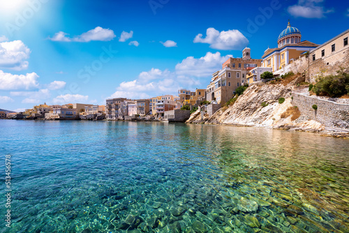 The emerald sea at the Vaporia district, city of Ermoupoli at Syros island, Cyclades, Greece, during a sunny summer day photo