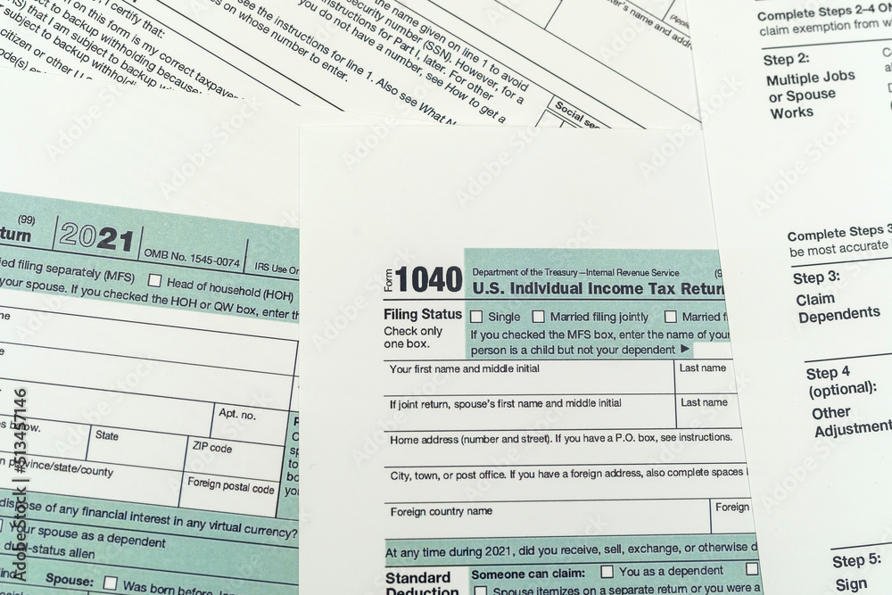 Fototapeta premium empty 1040 individual tax form ready to fill in office desk