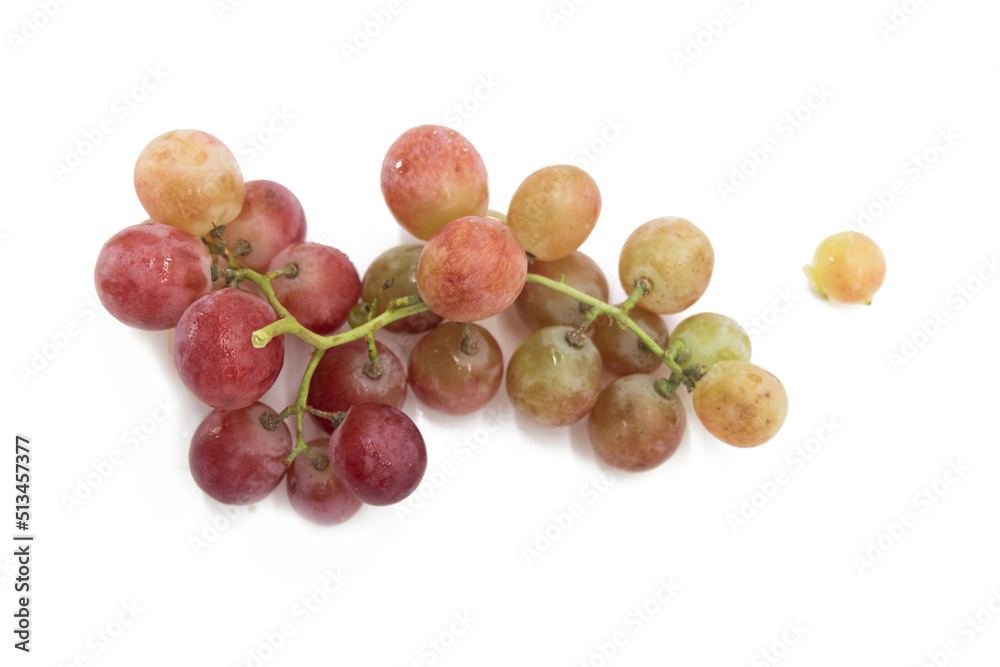 Red grapes placed on a white background, View from above