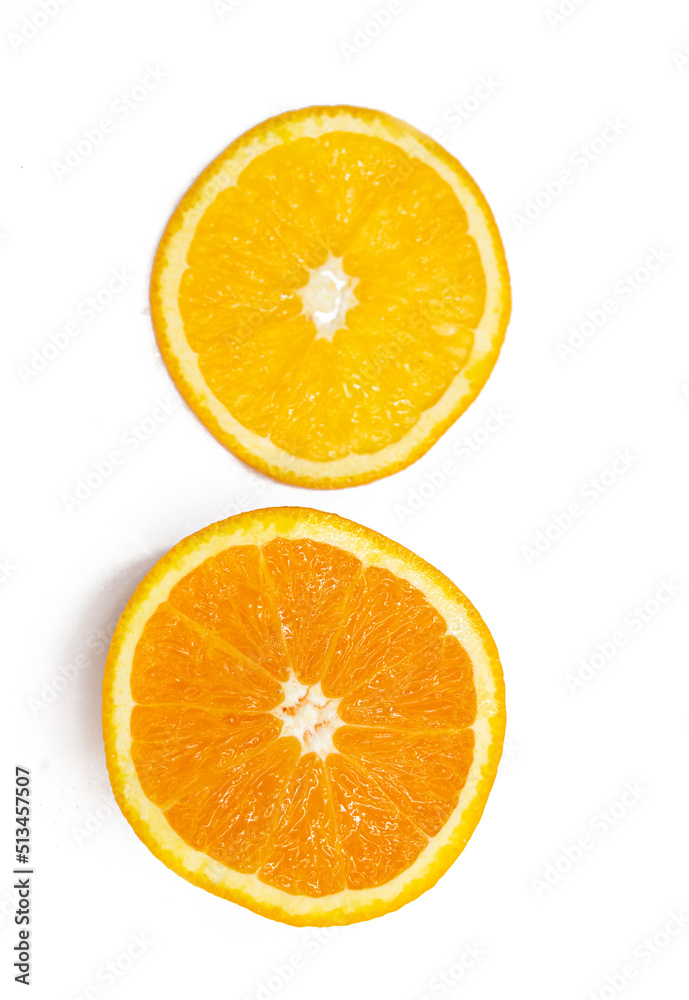 fresh orange fruit slices over on white background.top view