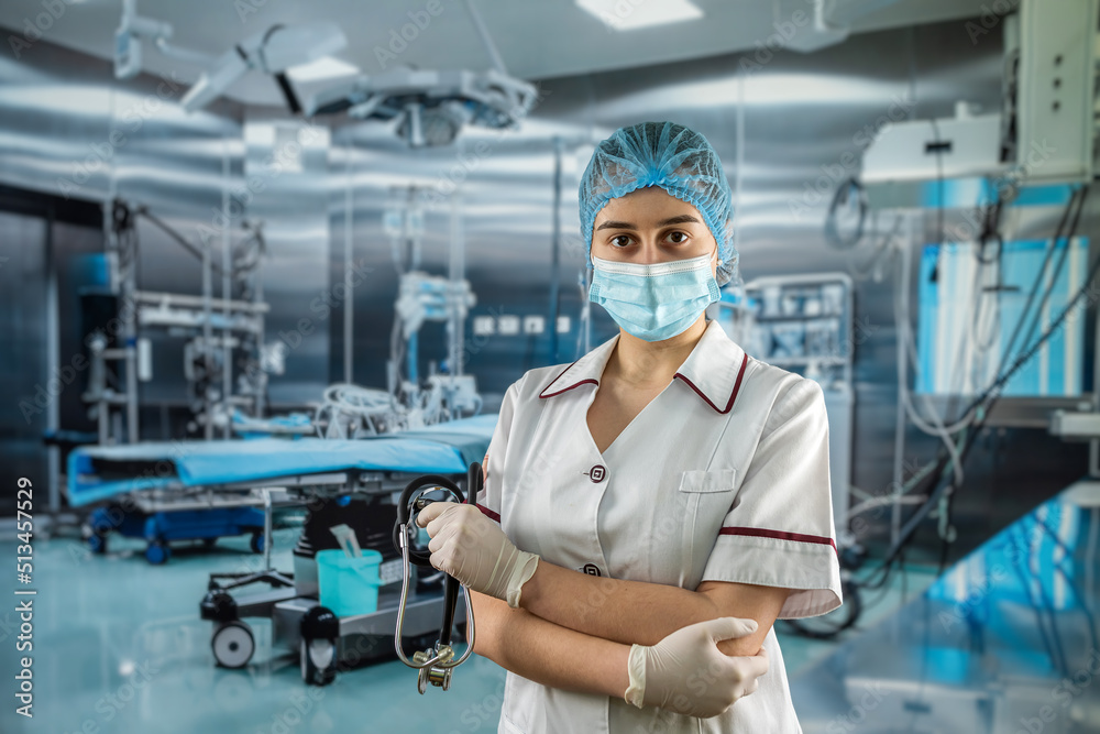 Portrait of a young prety female doctor or medical assistant wear white uniform with stethoscope