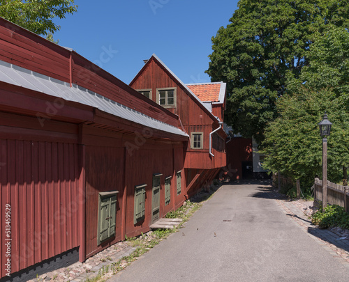 A 1700s red wood house, Bellmanshuset, in the island Djurgården a sunny summer day in Stockholm