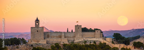 Leinwand Poster Alcazaba fortress in Antequera at sunset- Spain