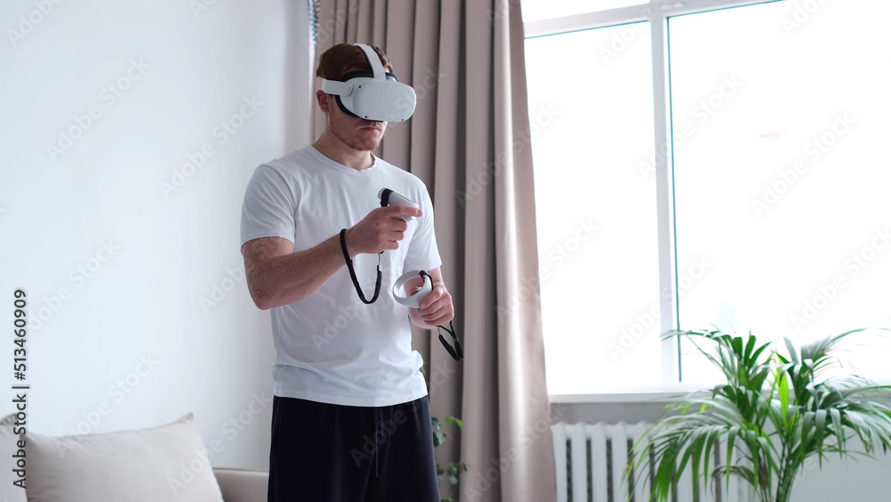 Handsome man wearing future technology VR glasses. Young man using AR. wearing virtual reality device. Handsome man wearing future technology VR glasses. Young man using AR. wearing virtual reality device.
