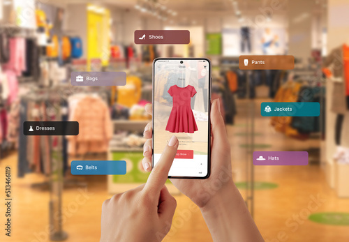 Buying clothes with virtual reality app on a smart phone. Choosing the color and size of the dress
