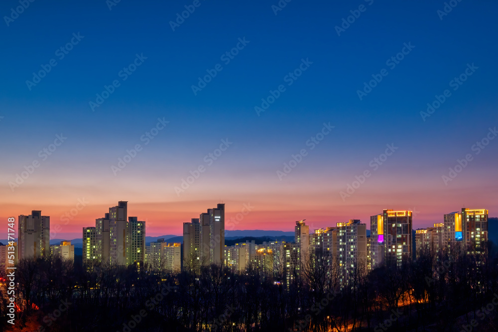 Obraz premium Scenic view of city scape against sky during sunset