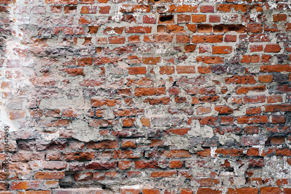 Naklejka premium Old brick wall destroyed red color