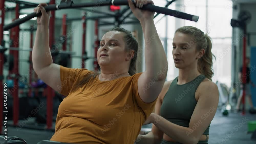 Caucasian woman with overweight doing training at the gym. Shot with RED helium camera in 4K.