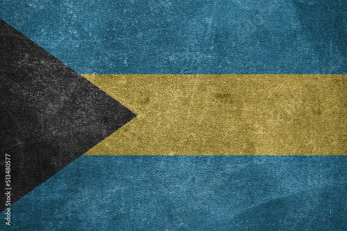 Old leather shabby background in colors of national flag. Bahamas