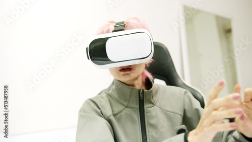 Female used VR Headset at Living Room
