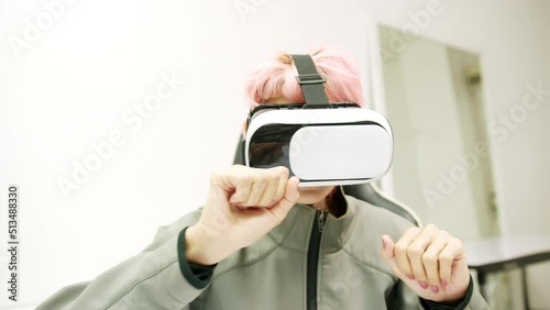 Female used VR Headset at Living Room