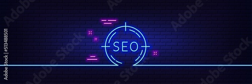 Neon light glow effect. Seo target line icon. Search engine optimization sign. Aim symbol. 3d line neon glow icon. Brick wall banner. Seo outline. Vector