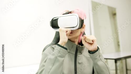Female used VR Headset at Living Room