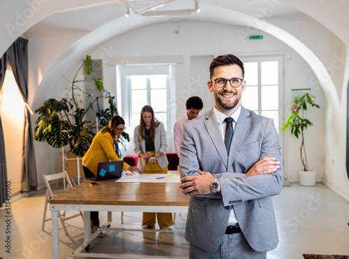 Portrait of confident businessman in office. photo