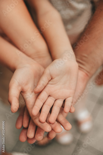 hands of parents and children
