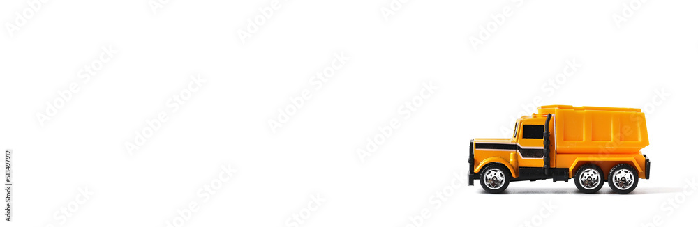 Mini yellow dump truck isolated on white background, Copy space. Mini yellow dump truck isolated on white background, Copy space.