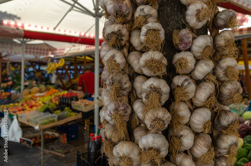 Strings of Garlic at the Market