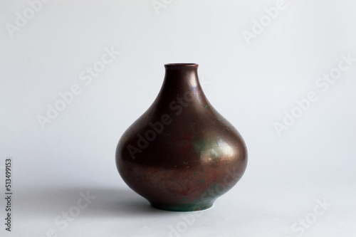 Mid-century modern style vase with glossy brown glaze