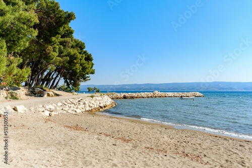 Fototapeta Naklejka Na Ścianę i Meble -  Beautiful view of an empty sandy beach on the coast of the Adriatic sea in Duce, Croatia
