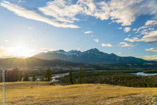 Jasper National Park Canadian Rockies beautiful scenery. Panoramic view Athabasca River valley forest and Pyramid Mountain on sunset time. AB, Canada.